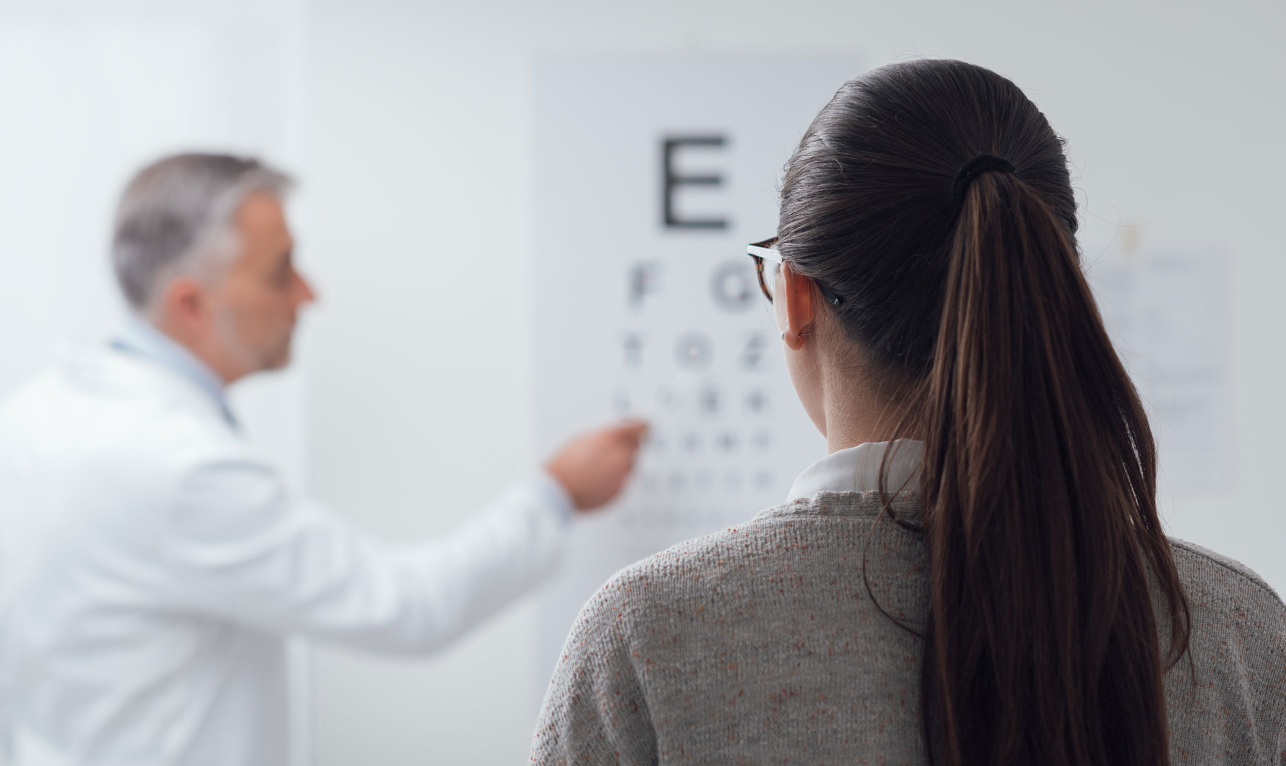 patient reading eye chart