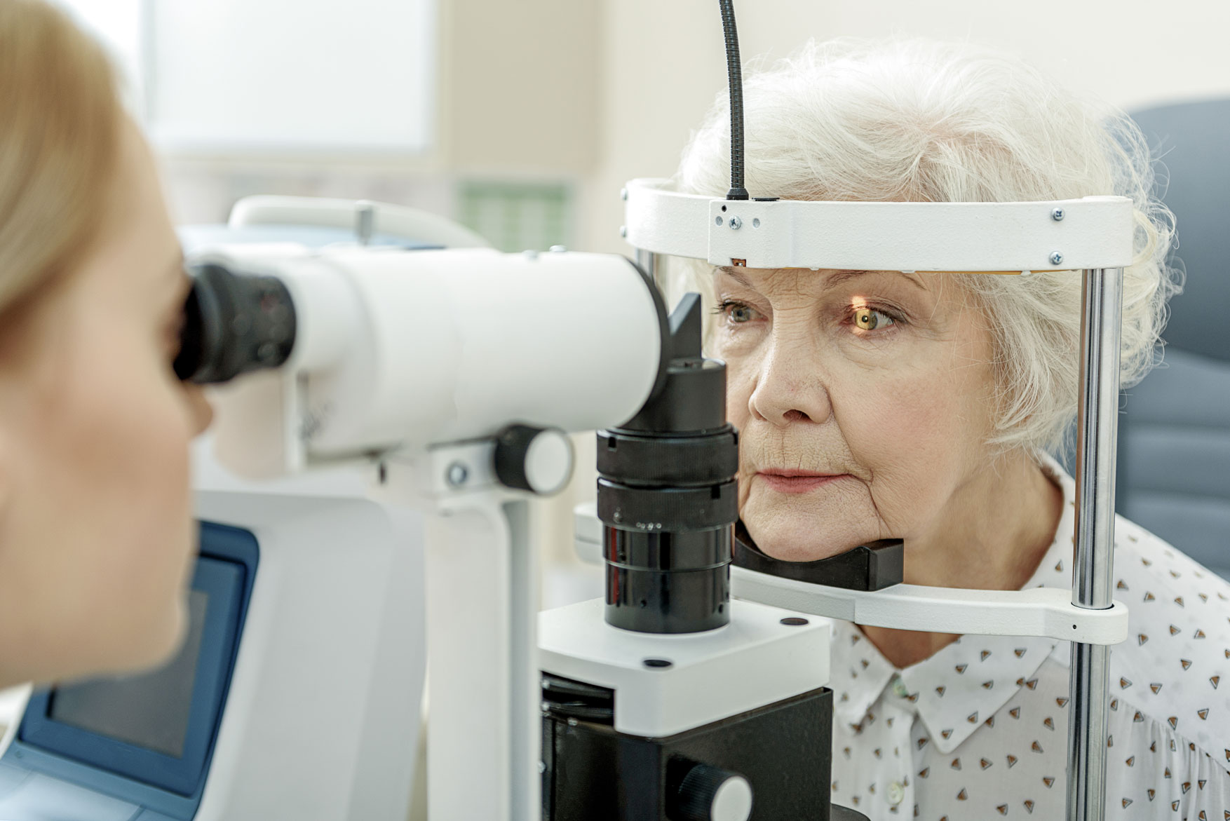 checking patient for cataracts